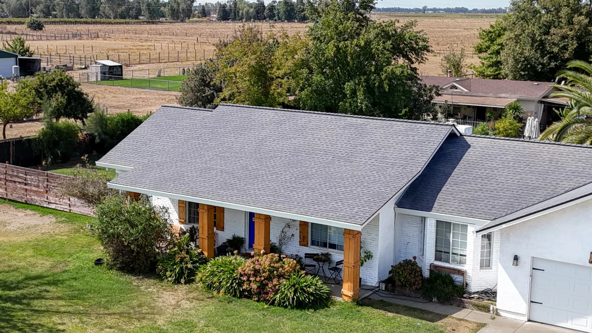 Close aerial view of a completed gray architectural shingle roof in the Sacramento area