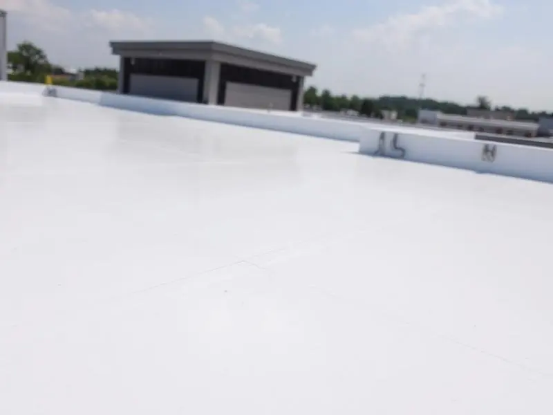 Flat low-slope TPO roof section on a Sacramento property
